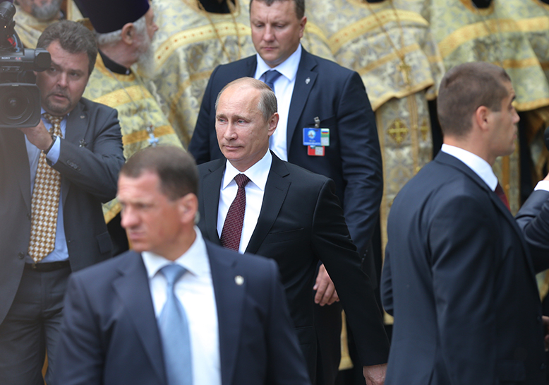 Putin med livvakter