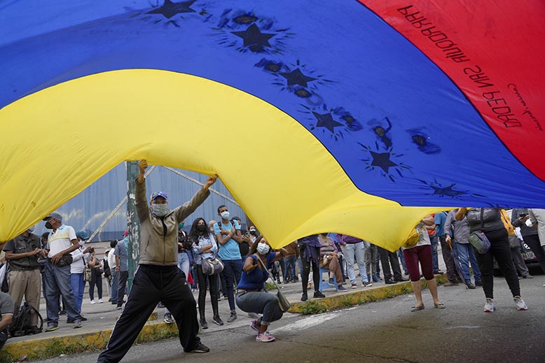 Valrörelse i Venezuela. Foto: AP/TT