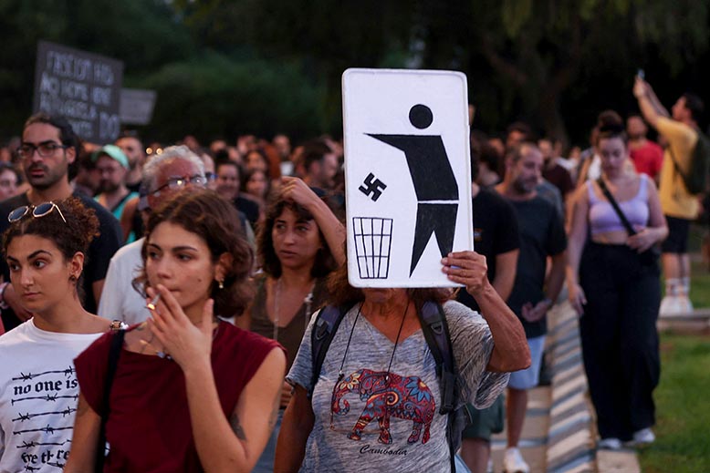 Protest på Cypern mot högerextrema attacker på migranter. Foto: AFP/TT